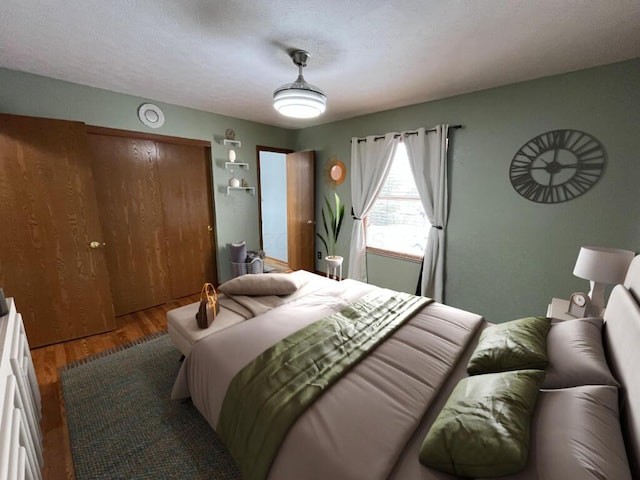 bedroom with wood-type flooring