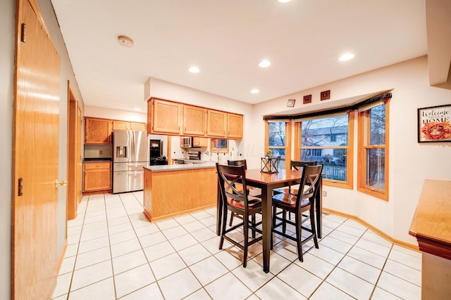 dining room with light tile patterned floors