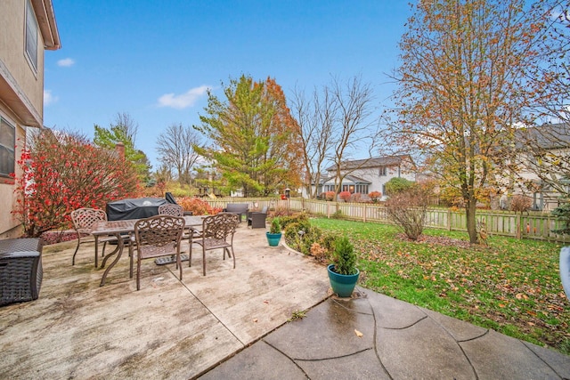 view of patio featuring a grill