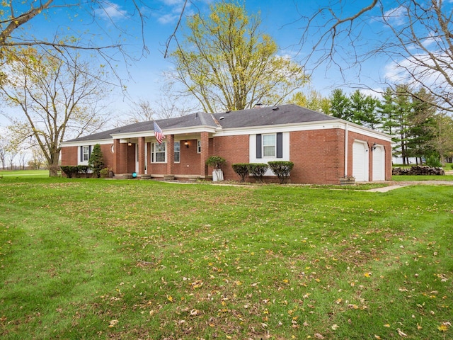 ranch-style home featuring a garage and a front lawn