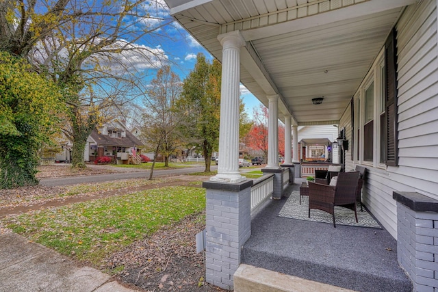 view of patio featuring a porch