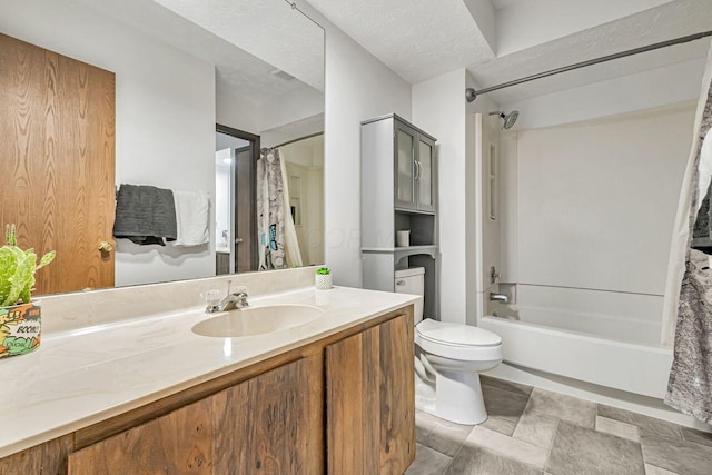 full bathroom with toilet, vanity, a textured ceiling, and shower / bath combo