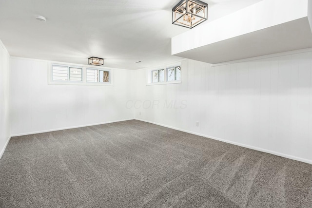 basement with carpet and a healthy amount of sunlight