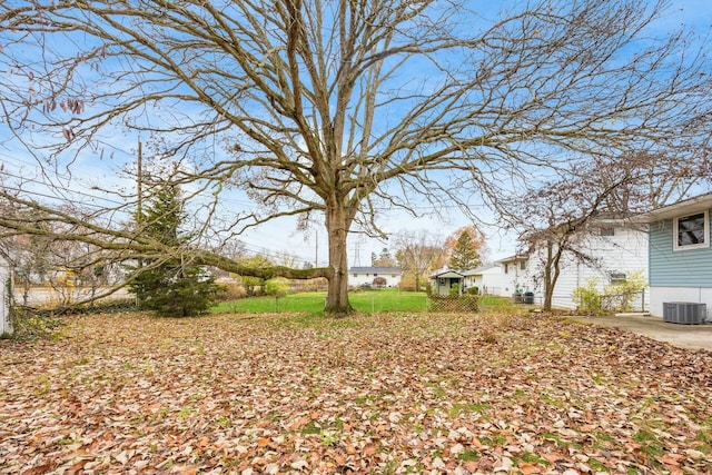 view of yard featuring central AC