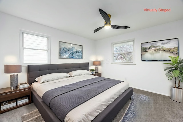 carpeted bedroom featuring ceiling fan