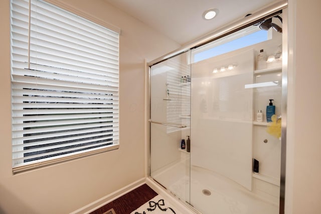 bathroom with an enclosed shower