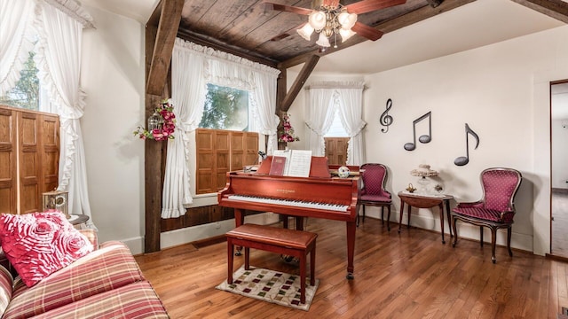 misc room featuring hardwood / wood-style flooring, plenty of natural light, wooden ceiling, and ceiling fan