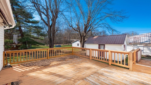 wooden deck with a shed