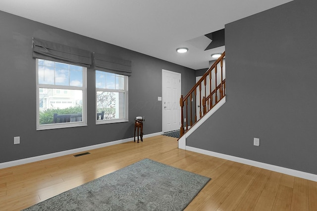 entrance foyer with hardwood / wood-style flooring