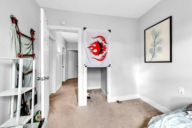 bedroom featuring light carpet