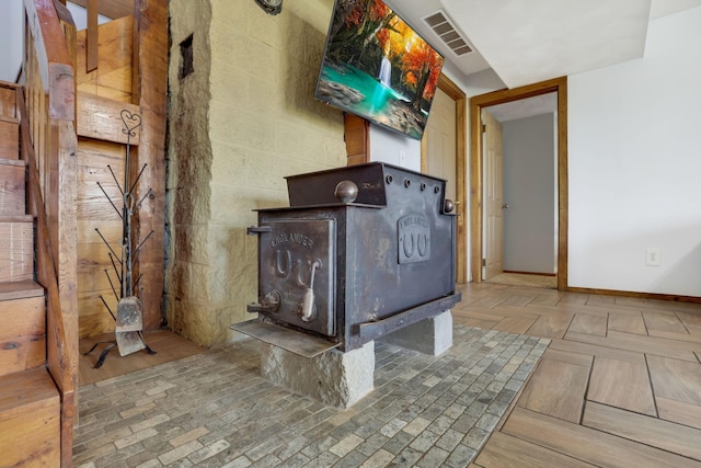 interior details featuring a wood stove