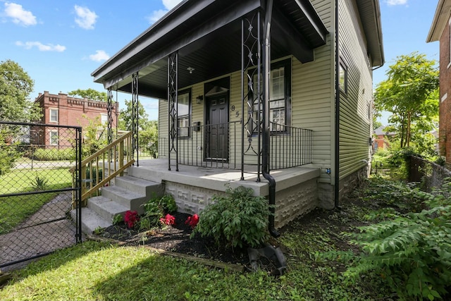 view of side of property with a porch