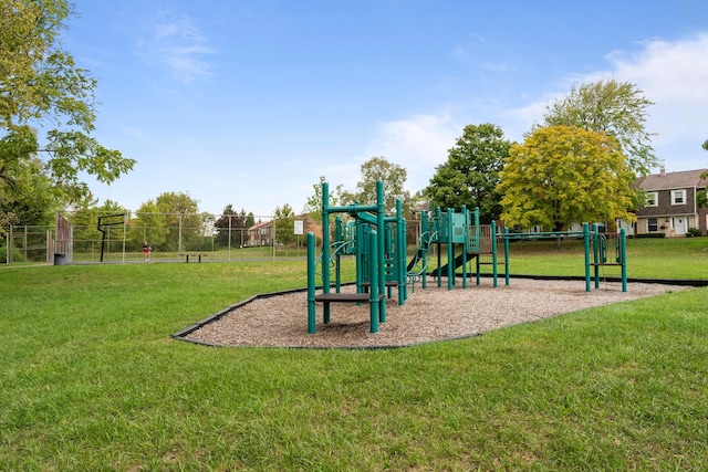 view of jungle gym with a lawn