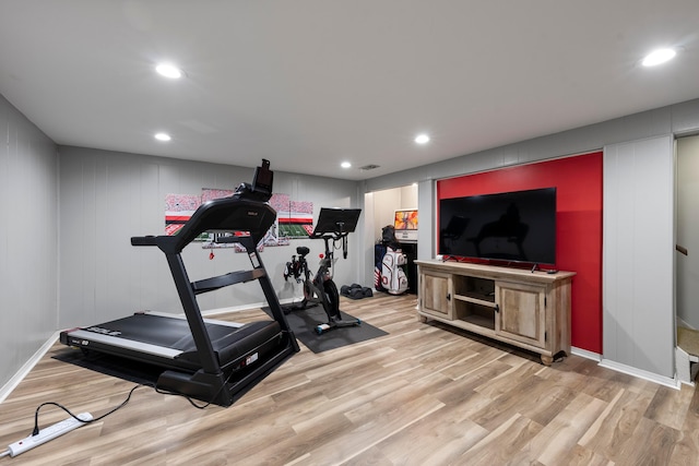 workout area with light wood-type flooring