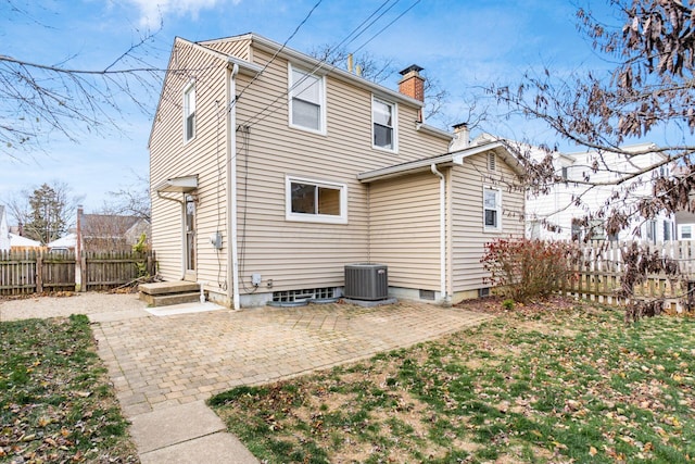 back of house with a patio area