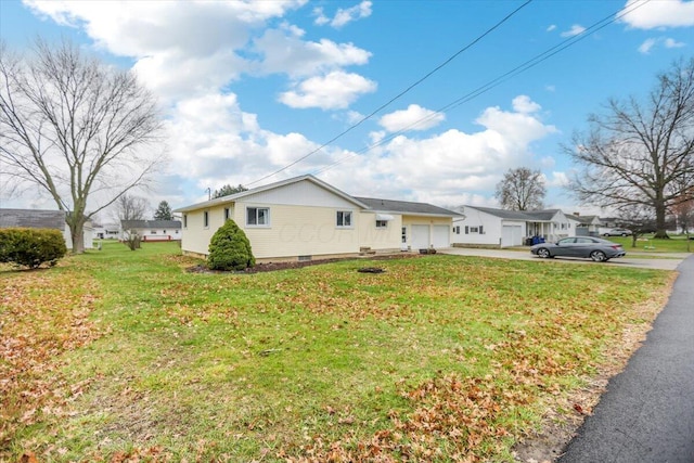 view of property exterior featuring a lawn