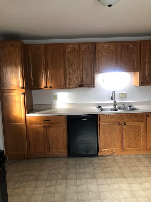 kitchen with sink and black dishwasher