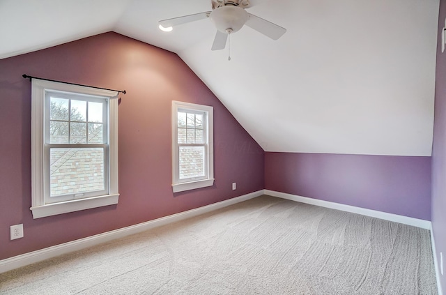 bonus room featuring carpet floors, vaulted ceiling, and ceiling fan