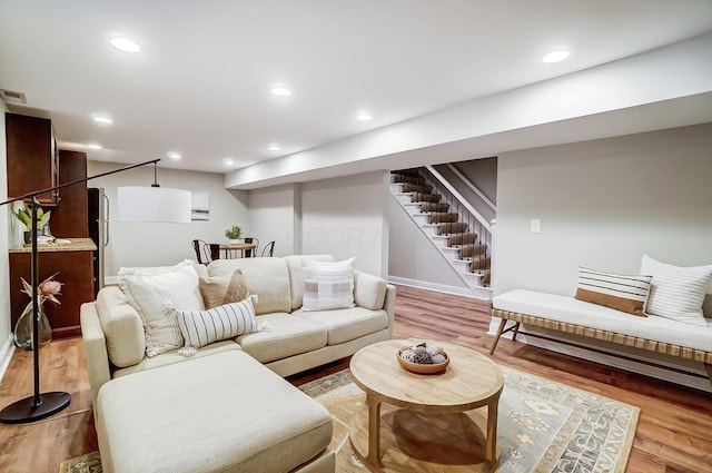 living room with light hardwood / wood-style floors