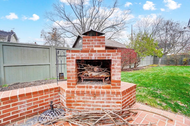 view of patio / terrace with a fireplace