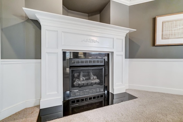 details featuring carpet and crown molding