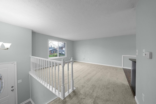 interior space featuring a textured ceiling