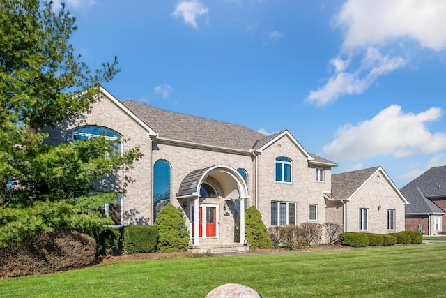 front of property featuring a front lawn