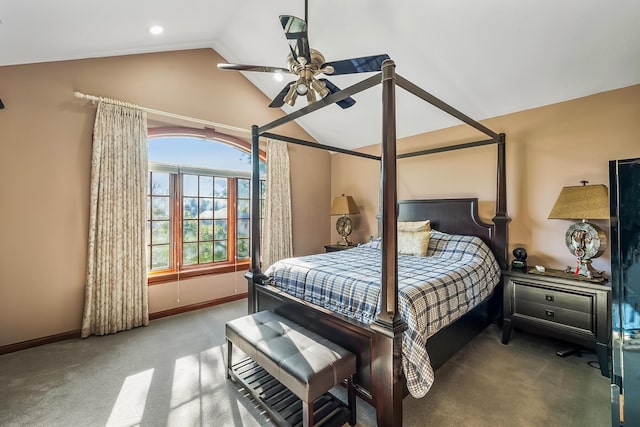 carpeted bedroom featuring vaulted ceiling and ceiling fan