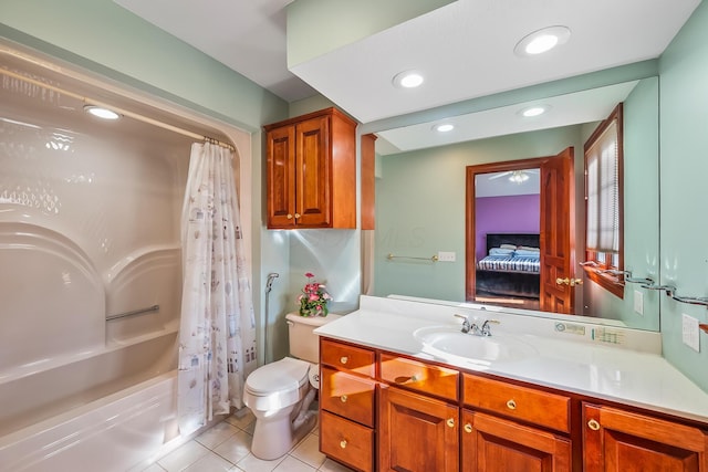 full bathroom featuring tile patterned floors, shower / bath combination with curtain, toilet, and vanity