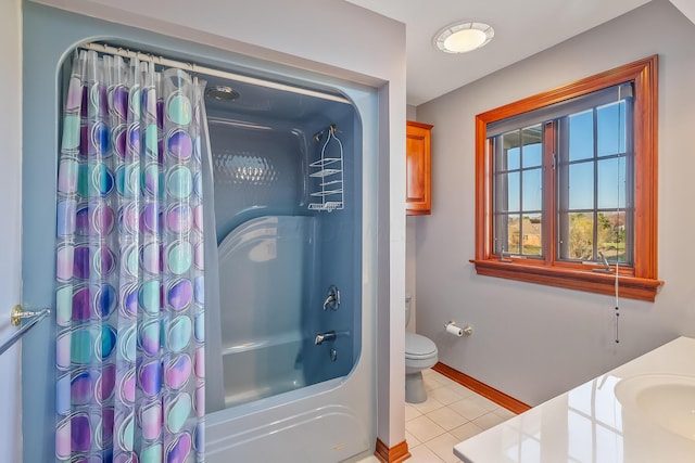 full bathroom featuring toilet, shower / bath combination with curtain, vanity, and tile patterned floors