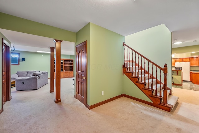 stairway with carpet floors