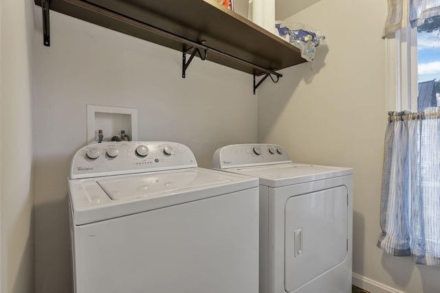 laundry area featuring washing machine and dryer