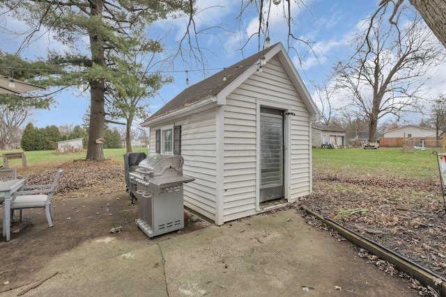 view of outdoor structure with a yard