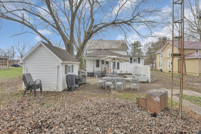 back of property featuring a patio