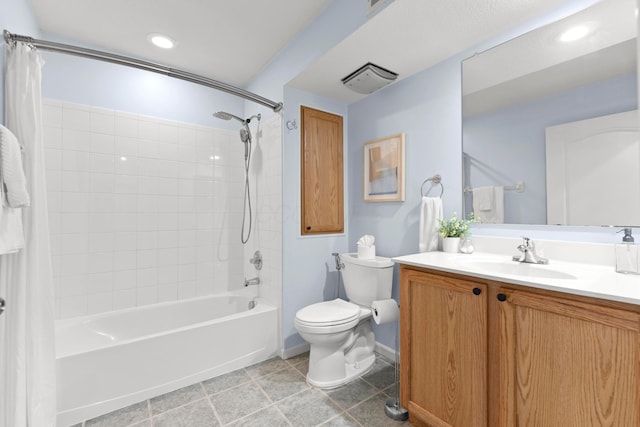 full bathroom featuring tile patterned floors, shower / bathtub combination with curtain, vanity, and toilet