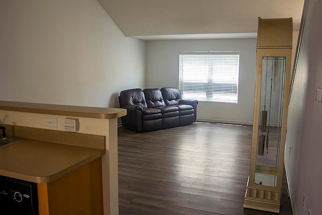 sitting room with dark hardwood / wood-style floors