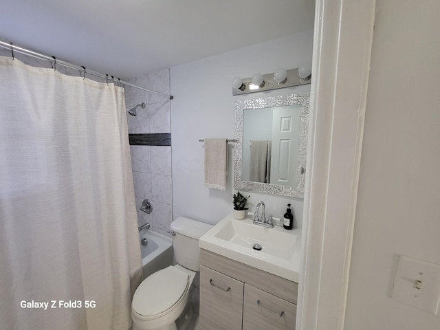 full bathroom featuring shower / bath combination with curtain, vanity, and toilet