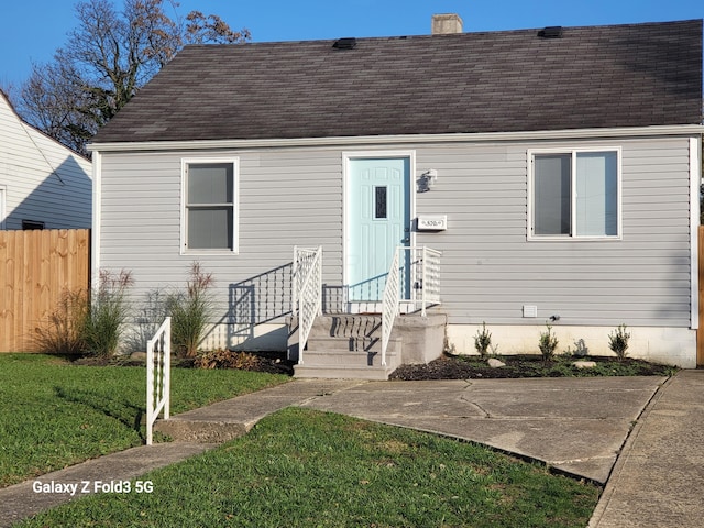 view of front facade with a front yard