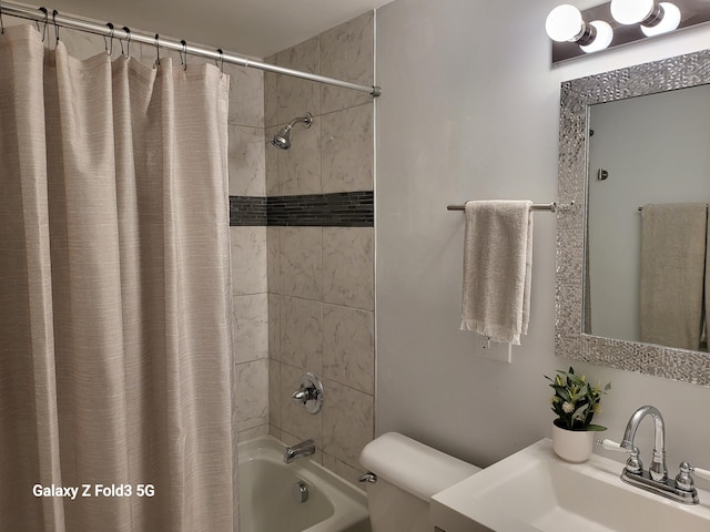 full bathroom featuring vanity, toilet, and shower / tub combo with curtain