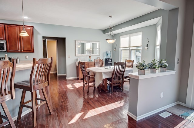 dining room featuring dark hardwood / wood-style floors