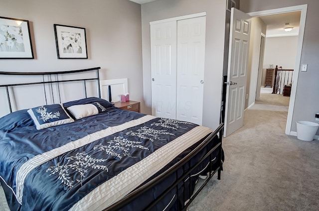 carpeted bedroom featuring a closet