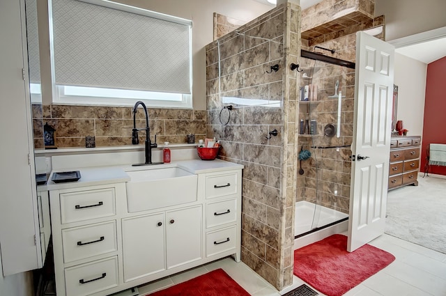 bathroom with vanity and an enclosed shower