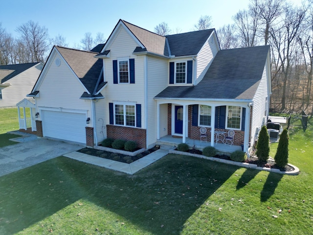 view of front facade with covered porch and a front yard