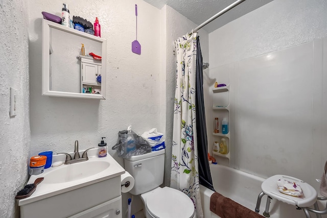 full bathroom featuring vanity, shower / tub combo, and toilet