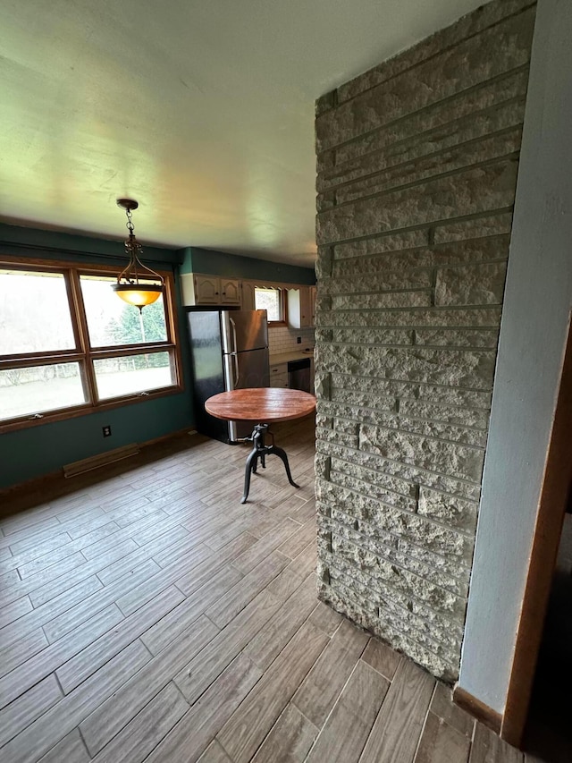 dining room with light wood-type flooring