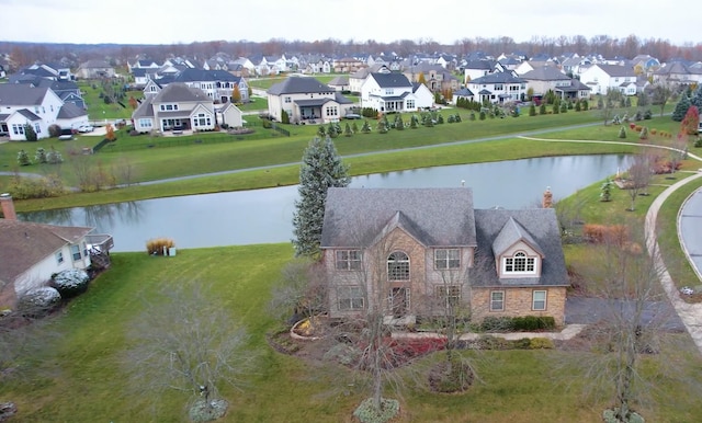 drone / aerial view with a water view