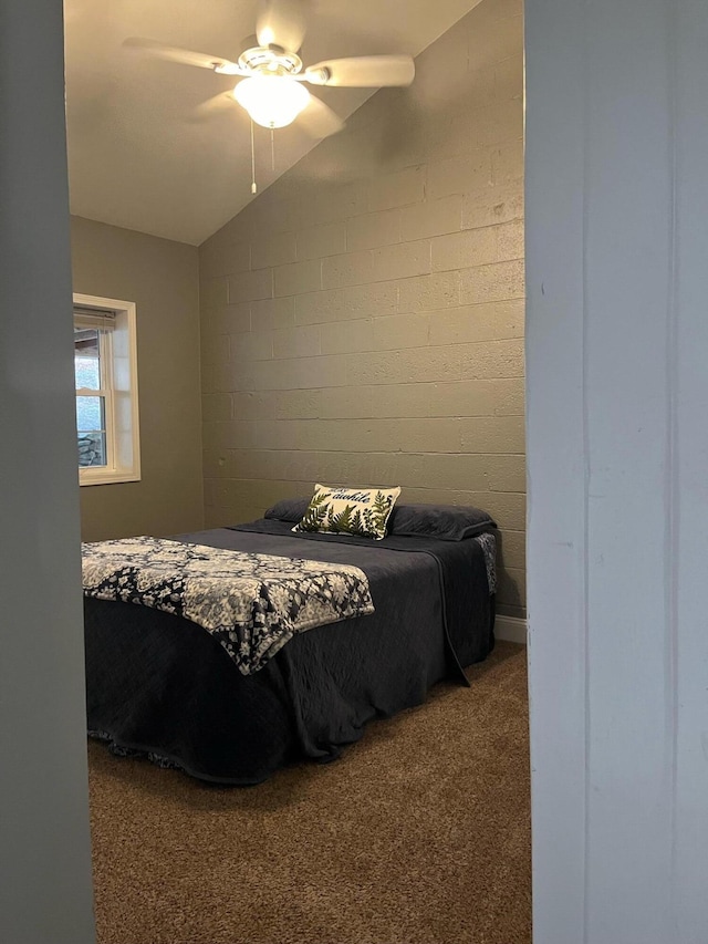 bedroom with carpet floors, ceiling fan, and lofted ceiling