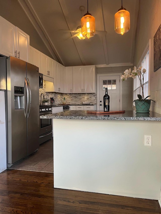 kitchen featuring decorative backsplash, appliances with stainless steel finishes, light stone countertops, decorative light fixtures, and white cabinets