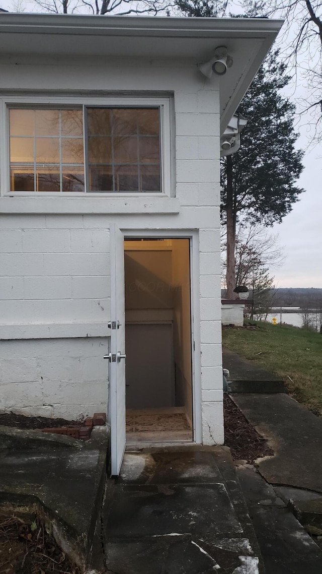 property entrance with a water view