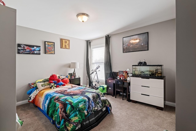 bedroom featuring light colored carpet